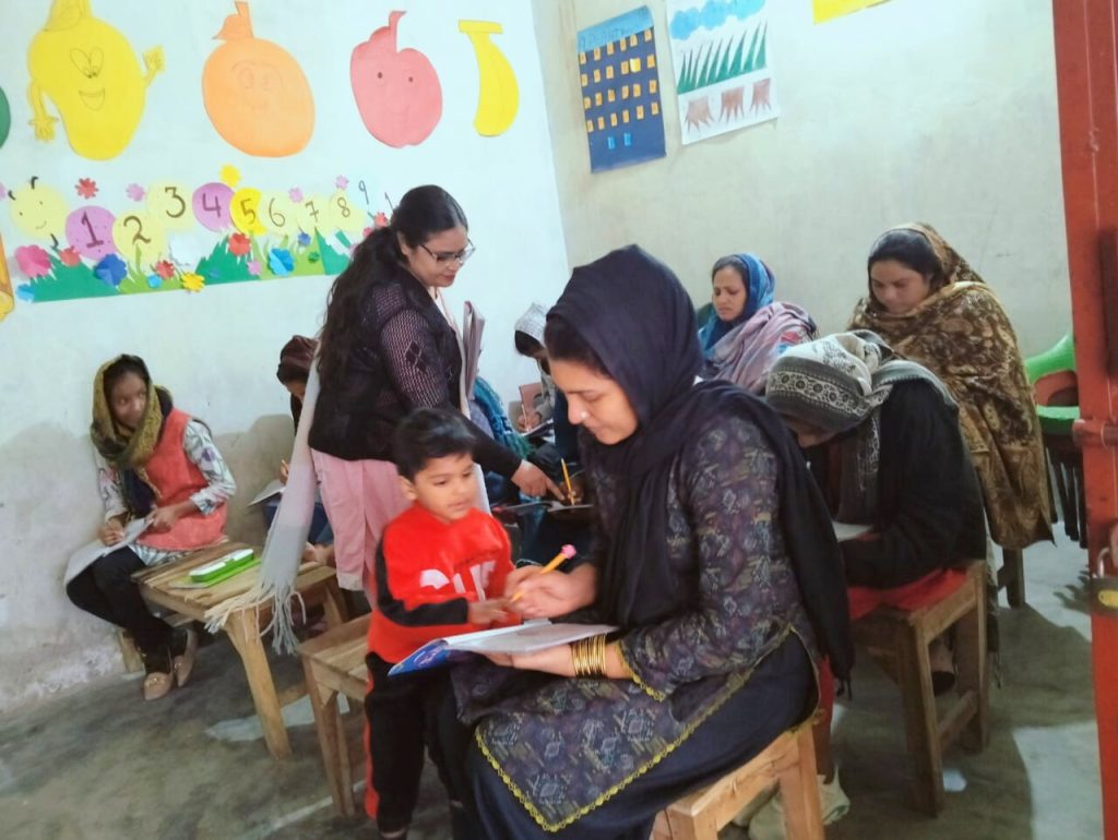 A group of mothers in the classroom